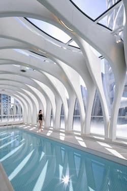 A two-lane, 50-meter pool is accented by prefabricated structural ribs. A two-lane, 50-meter pool is accented by prefabricated structural ribs.
