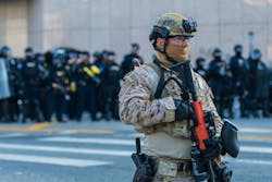 Border Patrol Agent during anti ICE protest in downtown LA. Border Patrol Agent during anti ICE protest in downtown LA.