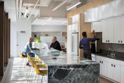 This part of the Center for Architecture and Design receives glare reflected from neighboring buildings, which makes it unsuitable for an office area but ideal for a shared kitchen. Photo courtesy Quinn Evans This part of the Center for Architecture and Design receives glare reflected from neighboring buildings, which makes it unsuitable for an office area but ideal for a shared kitchen. Photo courtesy Quinn Evans