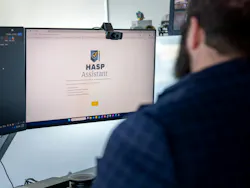 Man working on an AI tool on the computer AEC firm Man working on an AI tool on the computer AEC firm