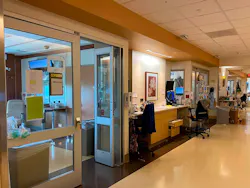 'Stealing” just a few inches from patient rooms created much needed extra space in an ICU corridor on the 12th floor of UK HealthCare’s Albert B. Chandler Hospital. The new, wider corridor feels more open and less cluttered. Photo courtesy GBBN 'Stealing” just a few inches from patient rooms created much needed extra space in an ICU corridor on the 12th floor of UK HealthCare’s Albert B. Chandler Hospital. The new, wider corridor feels more open and less cluttered. Photo courtesy GBBN