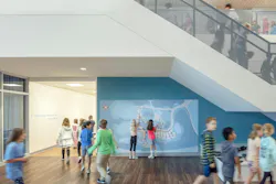 Large, simplified text signage reduces cognitive load and supports intuitive navigation for young learners as they build spatial confidence. Photo courtesy CannonDesign Large, simplified text signage reduces cognitive load and supports intuitive navigation for young learners as they build spatial confidence. Photo courtesy CannonDesign