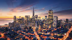 San Francisco aerial view from sea side. Port of San Francisco in the front. City downtown and skyscrapers at sunrise. San Francisco aerial view from sea side. Port of San Francisco in the front. City downtown and skyscrapers at sunrise.