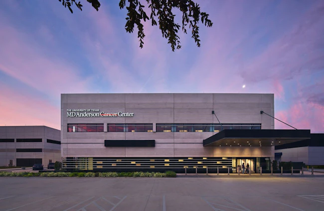 The MD Anderson Cancer Center Proton Therapy Expansion Center lobby and patient amenities are located behind the east fa&ccedil;ade, filtering the morning light. Photo &copy; Prakash Patel
