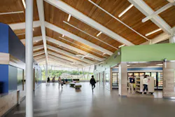 Wide corridors and natural materials reflect a core principle: what is essential for the most vulnerable users benefits everyone who moves through the building. Photo © James Ewing Photography Wide corridors and natural materials reflect a core principle: what is essential for the most vulnerable users benefits everyone who moves through the building. Photo © James Ewing Photography