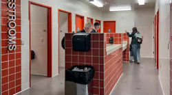 Single‑user restrooms at Graham‑Kapowsin High School are located off a main hallway in one wing, integrating universal access into daily student movement. Photo © NAC Architecture