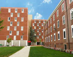 College Dormitory. Brick dormitory building with lawns and blue sky in Rutgers University. College Dormitory. Brick dormitory building with lawns and blue sky in Rutgers University.