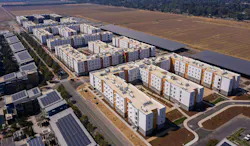 The Green at West Village, a student housing project at the University of California, Davis, includes a net zero energy district. It has a 5.5-megawatt solar array on parking structures. Photo courtesy Stantec