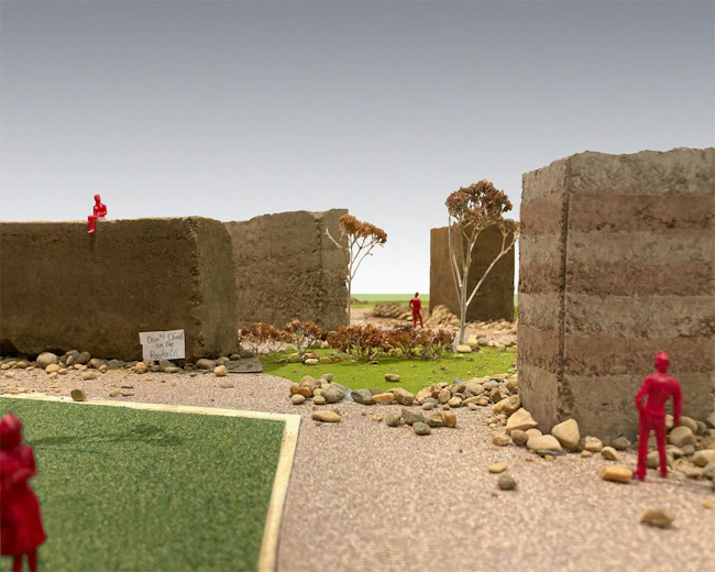 At KANEKO's Creative Camp, early student models translate material studies into spatial experience, where rammed earth walls begin to define enclosure, movement, and scale. Photo courtesy RDG Planning & Design