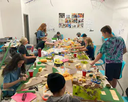 At KANEKO’s Creative Camp, students learn by doing, shaping landscapes, testing ideas, and constructing rammed earth walls through hands-on experimentation. Photo courtesy RDG Planning & Design