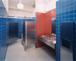 The bathrooms. “It was a little more colorful than we usually would do,” Brad Perkins recalls of the school’s energetic, primary-color palette. Photo © Seth Boyd