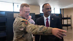 U.S. Army Col. Michael Soyka, Fort Bliss garrison commander, and El Paso Mayor Renard Johnson, tour the newly constructed 3-D barracks during a ribbon cutting ceremony on Fort Bliss, Texas, July 28, 2026. By partnering with ICON and the U.S. Army Engineers to finish construction in about six months, demonstrating a faster, more economical way to build high quality, energy efficient barracks that improves Soldier quality of life and supports mission readiness. Photo Credit: U.S. Army photo by Sgt. Brandon Camaquin