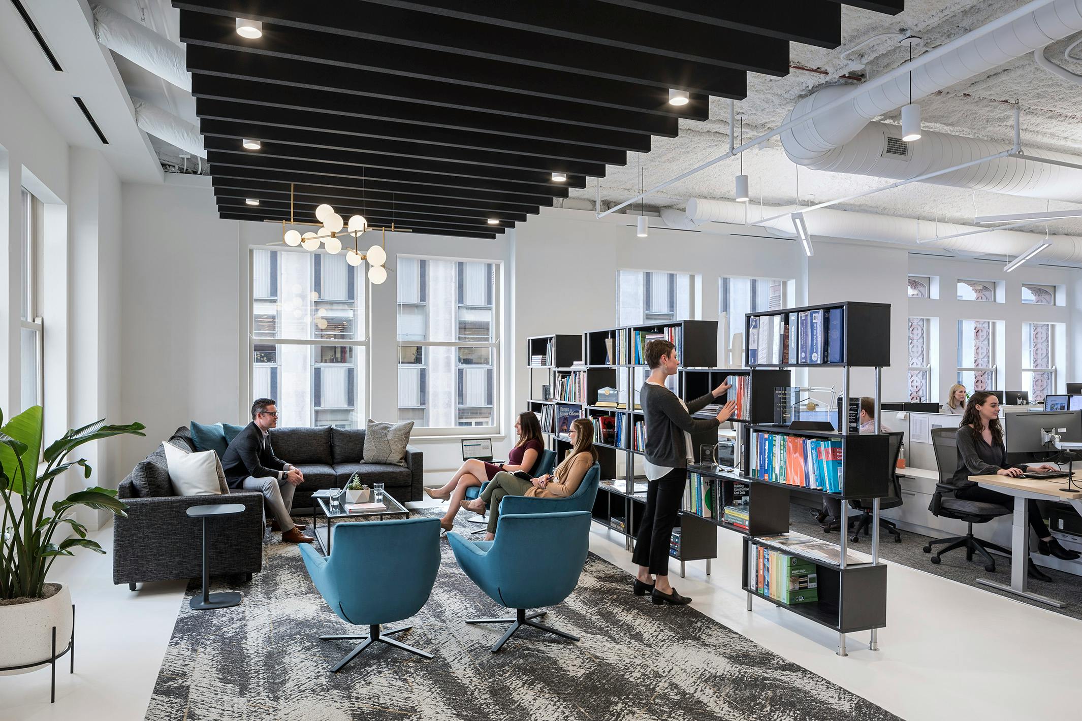The Hearth in Perkins Eastman's Chicago studio encourages professional and social interaction. Photo &copy; Andrew Rugge, courtesy Perkins Eastman