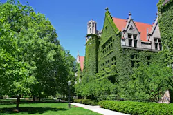 Ivy clad halls against blue sky of the University of Chicago campus