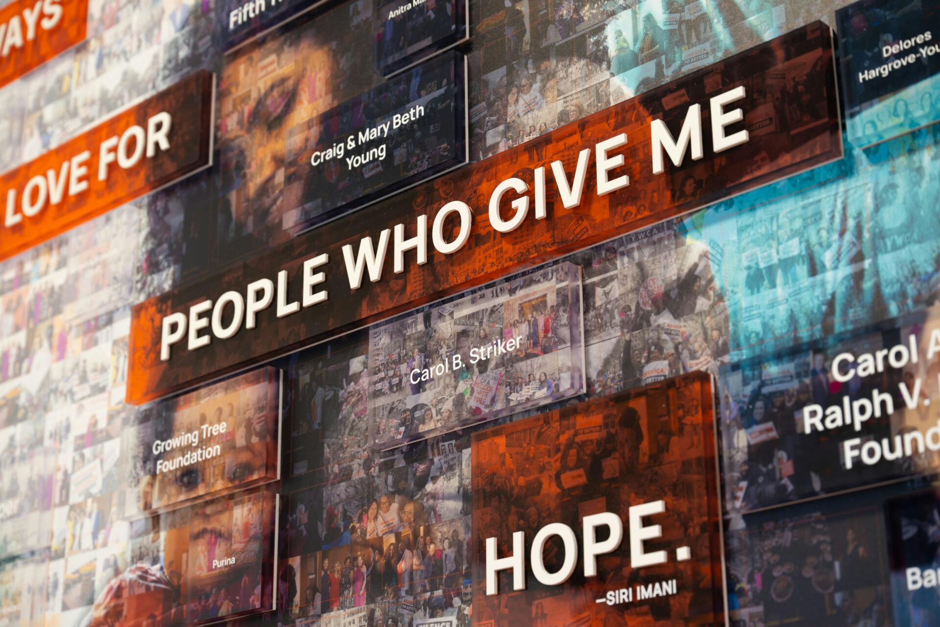 The donor wall mosaic is made of hundreds of local event photos featuring the people who have helped the YWCA of Greater Cincinnati thrive. Photo courtesy GBBN
