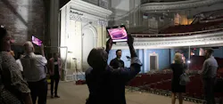 Potential donors experienced the finished theater using virtual reality which allowed them to see donor recognition opportunities and how they would look at the ribbon. Photo courtesy GBBN