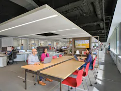 The new Ballinger studio resides in an existing LEED Gold building, where the firm retained many of the existing features to minimize demolition waste. Photo © Halkin Mason