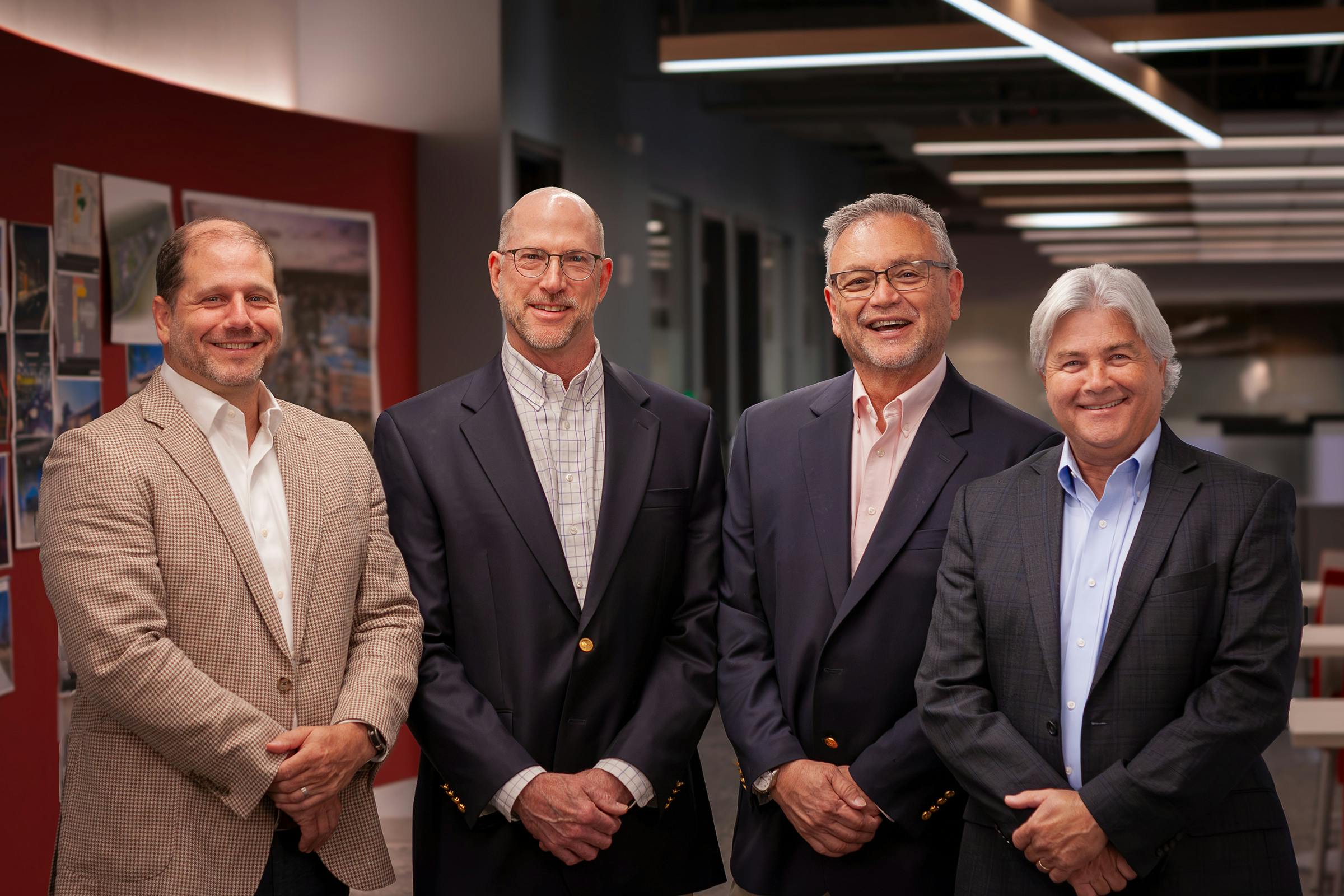 From left to right: Logan Meeks (President, A2H), Scott Rozanski (Principal, SpiritArchitecture Group), Jim Langford (Principal, SpiritArchitecture Group), and Pat Harcourt (CEO, A2H). Photo courtesy A2H