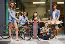 Bike, skateboard and portrait of urban friends on sidewalk together with smile, diversity and bonding. City, gen z style and group of people with street fashion, positive attitude and happy culture