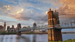 Cincinnati. Image of Cincinnati and John A. Roebling suspension bridge at sunset.