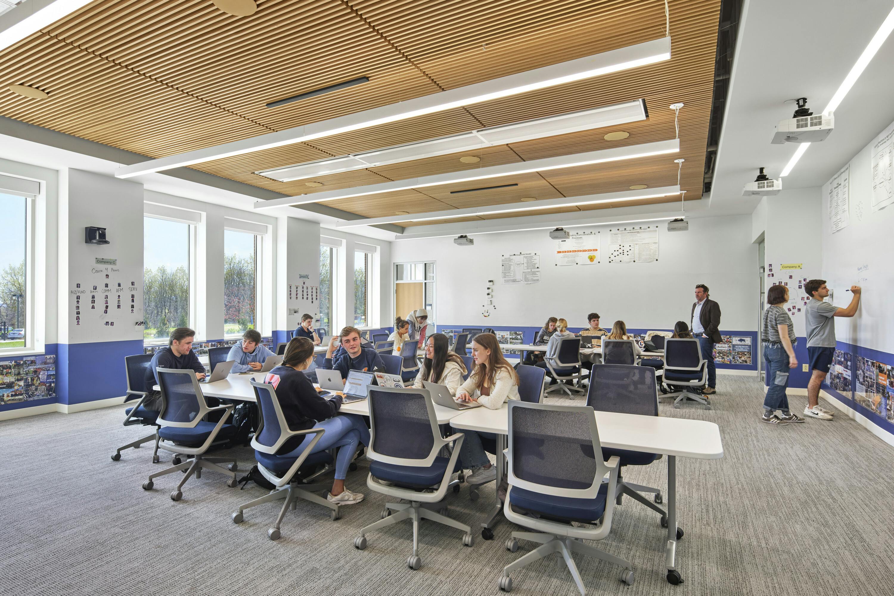 Absorbing, engaging, and creating in a classroom at Bucknell University&rsquo;s new building for the Freeman College of Management and department of Art &amp; Art History. Ample space allows for reconfiguration, exploration, and collaboration. The room replaces the instructor&rsquo;s podium with a nimble software interface. Photo courtesy CannonDesign