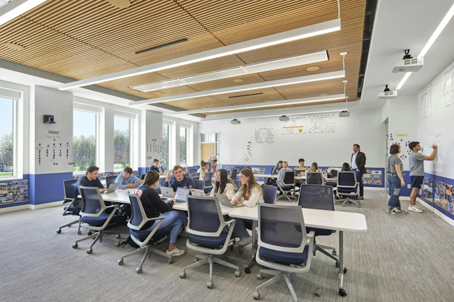 Absorbing, engaging, and creating in a classroom at Bucknell University&rsquo;s new building for the Freeman College of Management and department of Art & Art History. Ample space allows for reconfiguration, exploration, and collaboration. The room replaces the instructor&rsquo;s podium with a nimble software interface. Photo courtesy CannonDesign