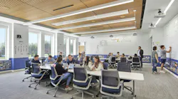Absorbing, engaging, and creating in a classroom at Bucknell University’s new building for the Freeman College of Management and department of Art & Art History. Ample space allows for reconfiguration, exploration, and collaboration. The room replaces the instructor’s podium with a nimble software interface. Photo courtesy CannonDesign