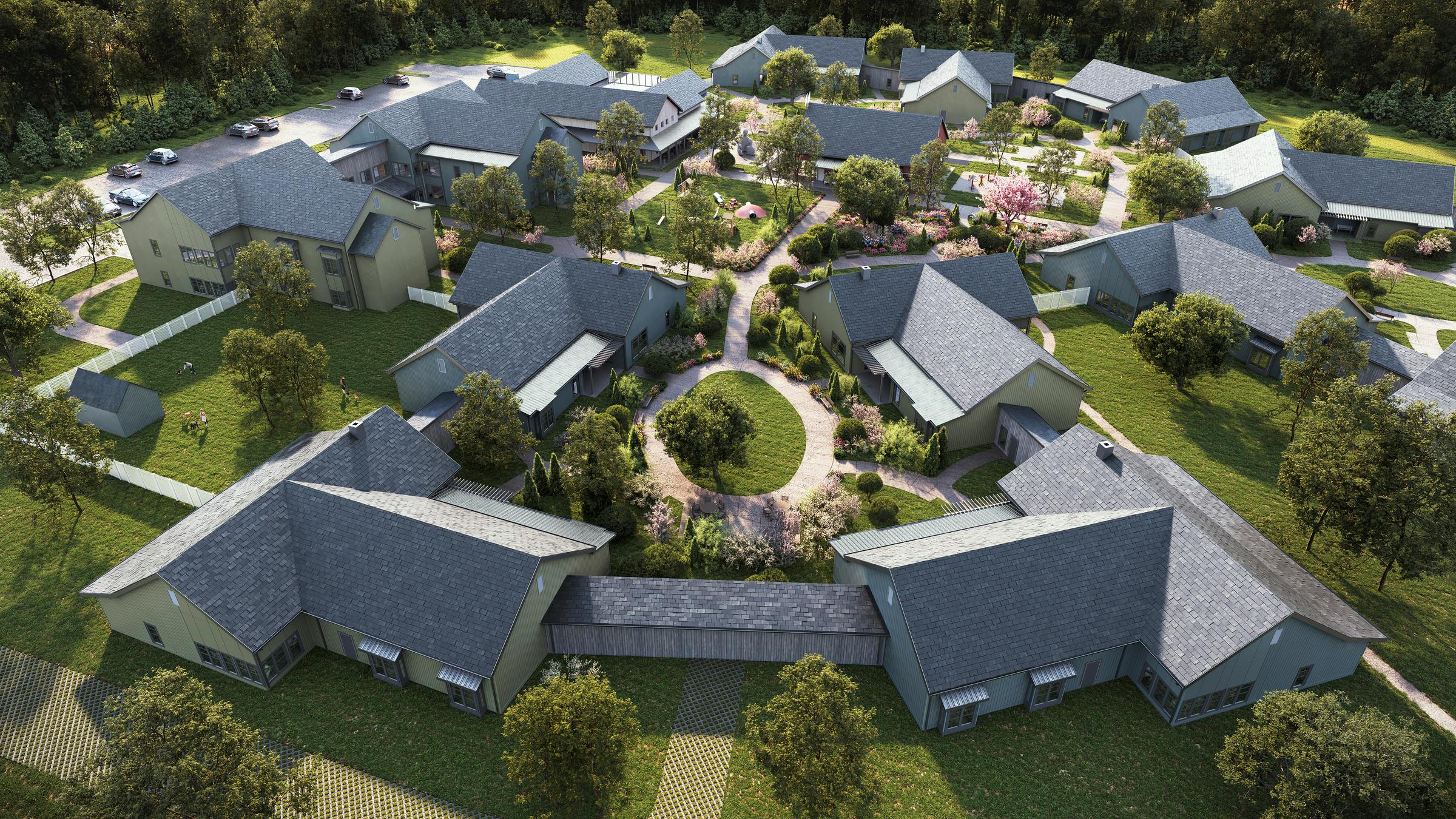 The design of Avandell&rsquo;s neighborhoods disguises its secure environment with landscaping and walking trails, decorative fencing, and interior passageways between buildings. Photo courtesy Perkins Eastman
